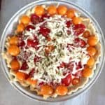 This gluten-free tomato pie takes only minutes to make. Filled with ricotta, parmesan, and mozzarella cheeses.